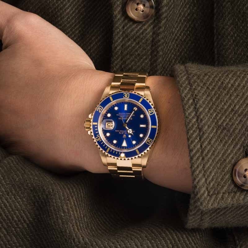 Pre-owned Yellow Gold Rolex Submariner ref 16618 Blue Dial